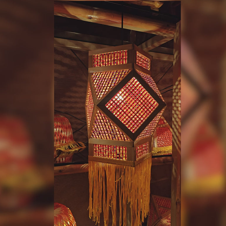 Decorative Mangal akash kandil lit at night — handmade bamboo Diwali lantern, hexagonal design